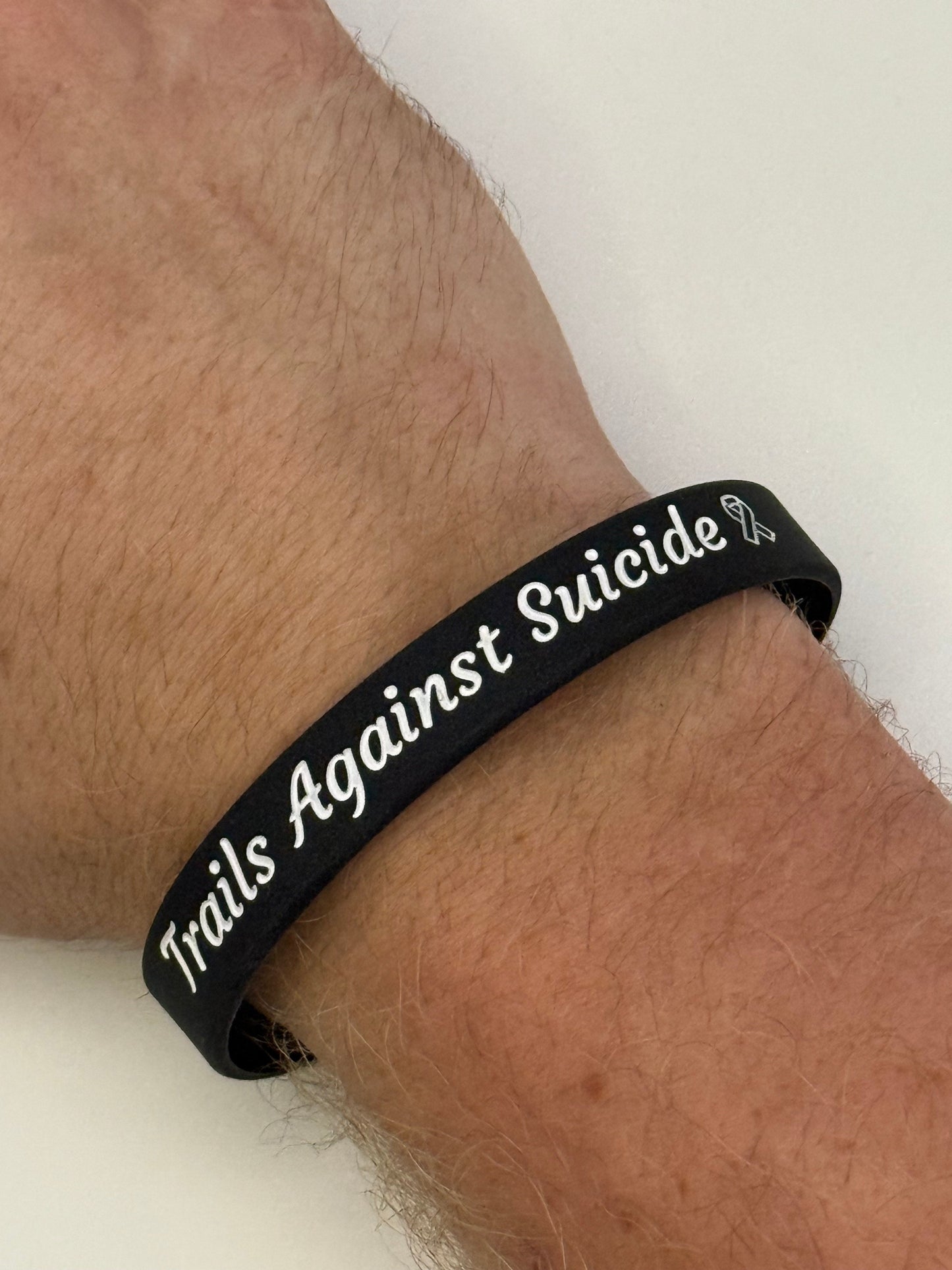 Trails Against Suicide Wristbands.
