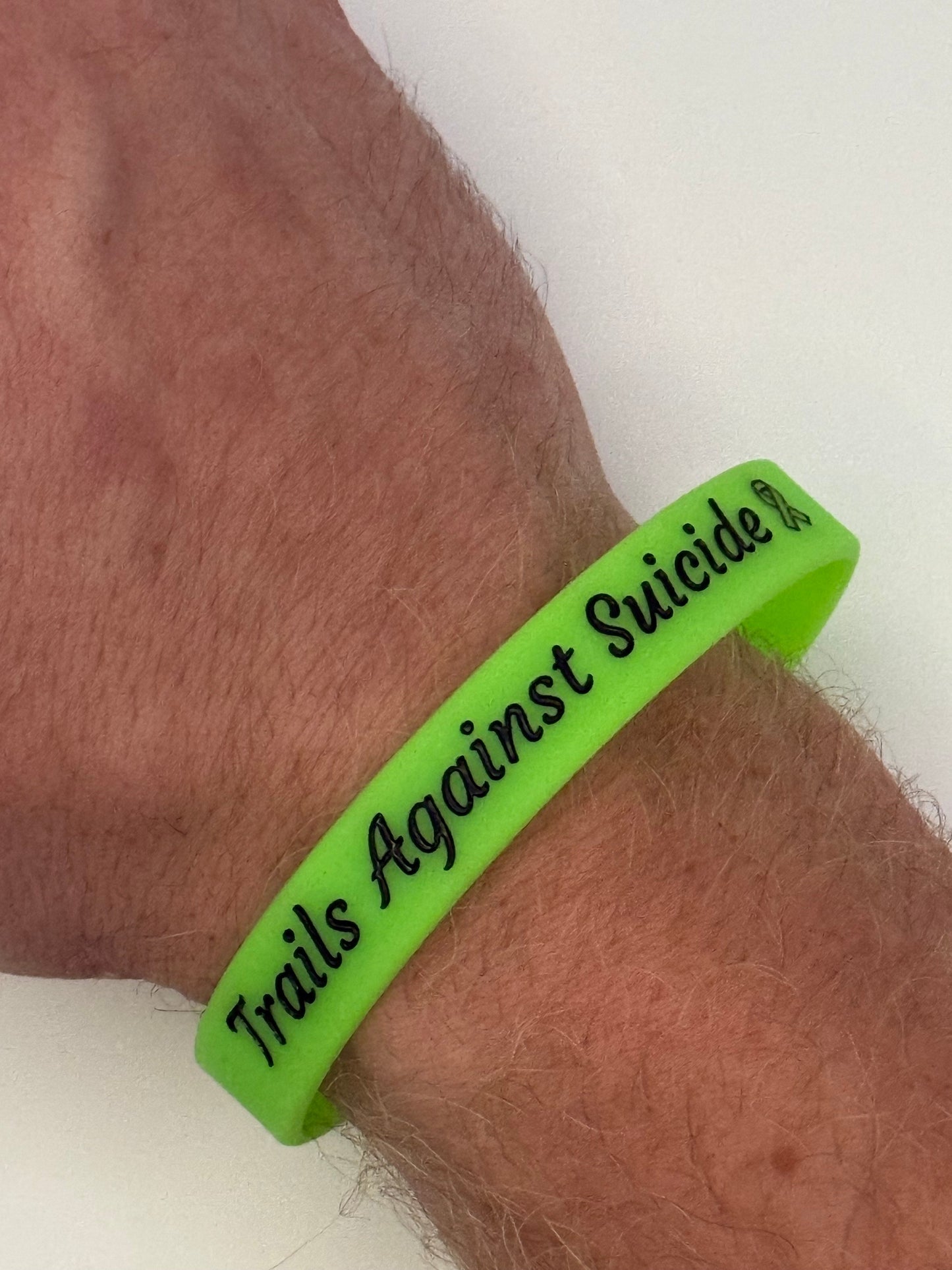 Trails Against Suicide Wristbands.