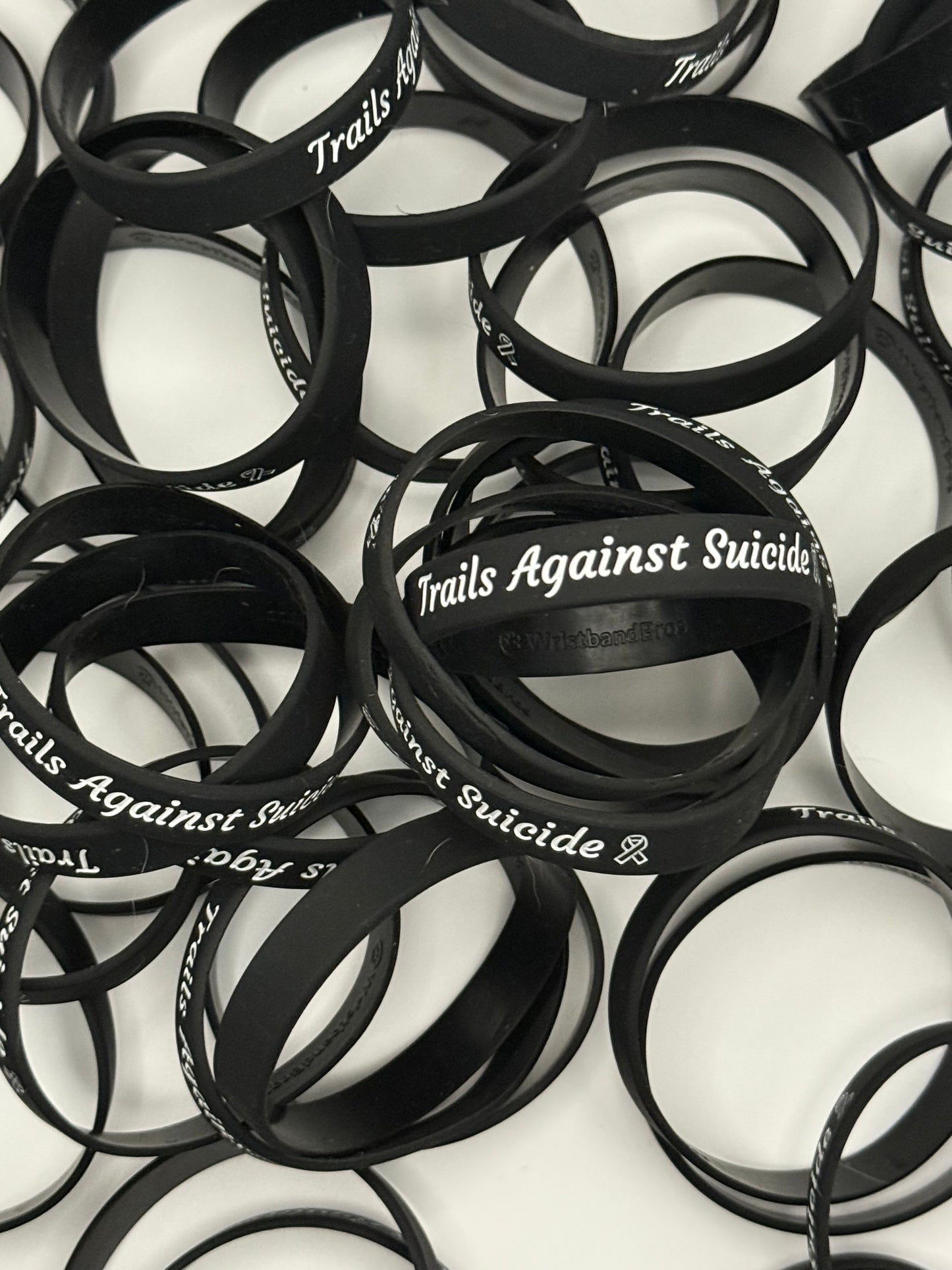 Trails Against Suicide Wristbands.