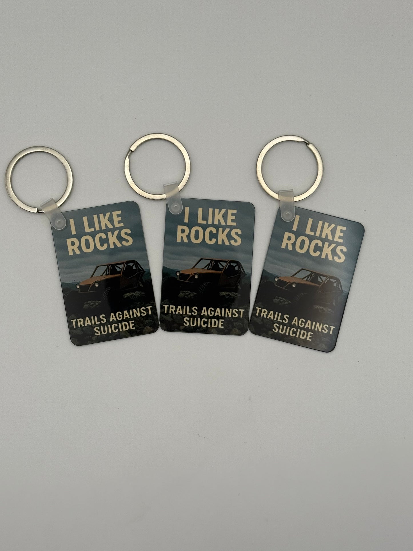 "I Like Rocks" Trails Against Suicide Buggy KeyChain
