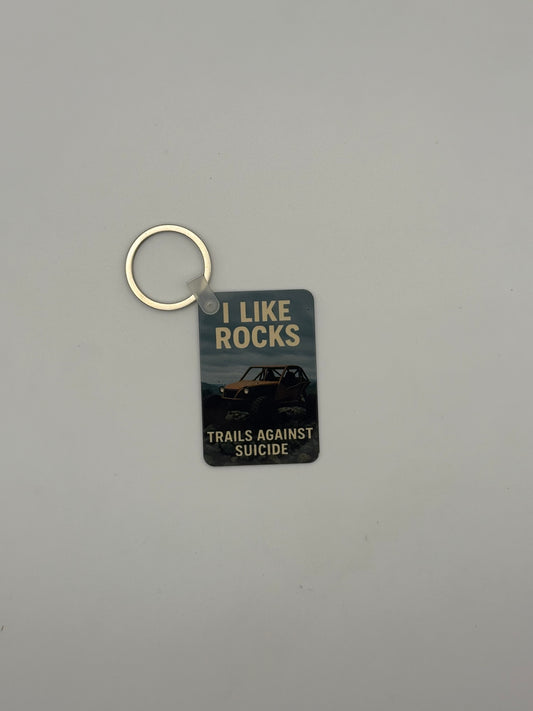 "I Like Rocks Buggy" Trails Against Suicide Square KeyChain.