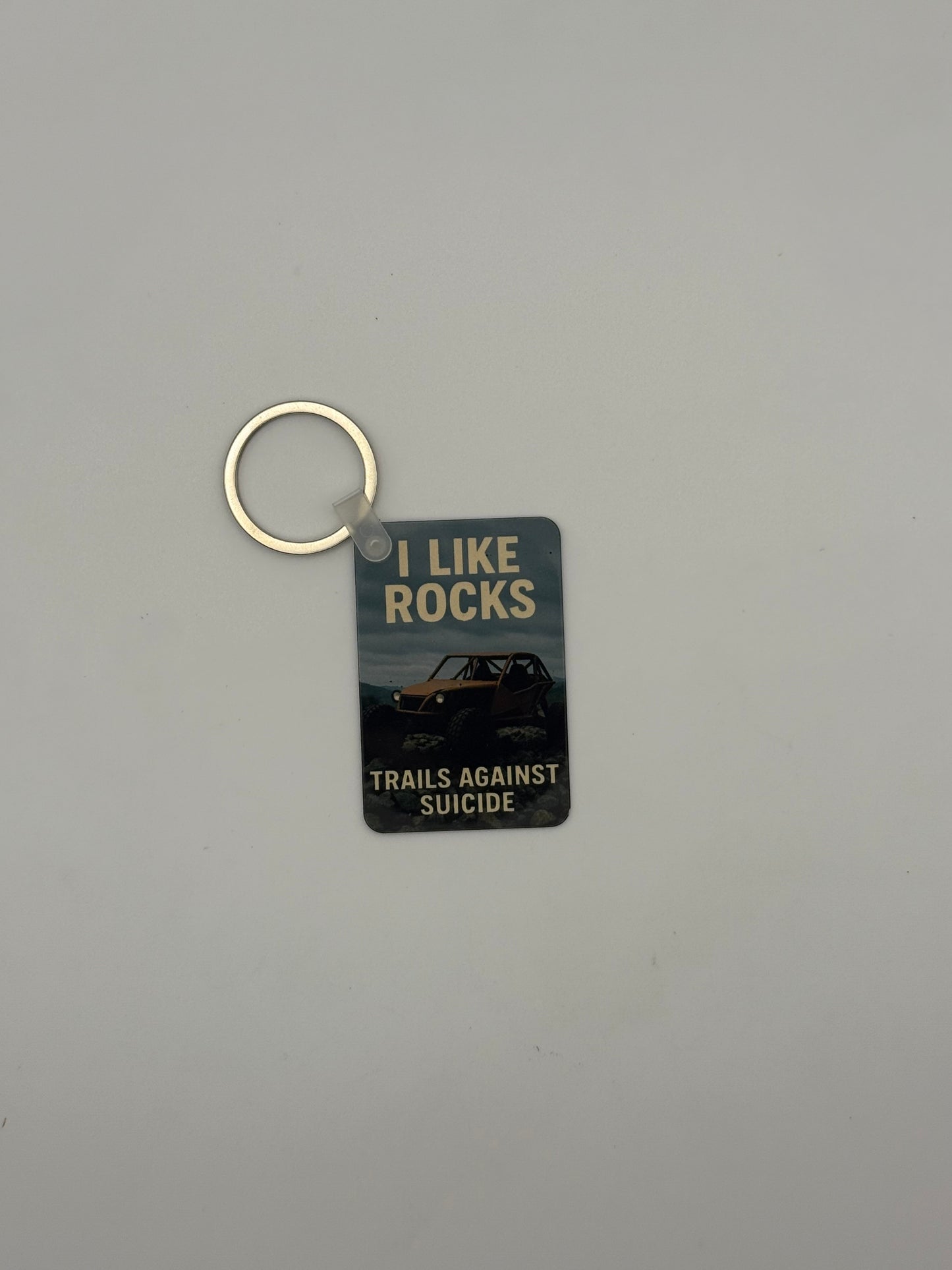 "I Like Rocks" Trails Against Suicide Buggy KeyChain