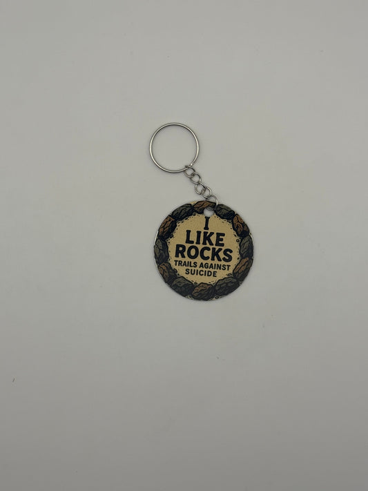 "I Like Rocks" Trails Against Suicide Circle Keychain.